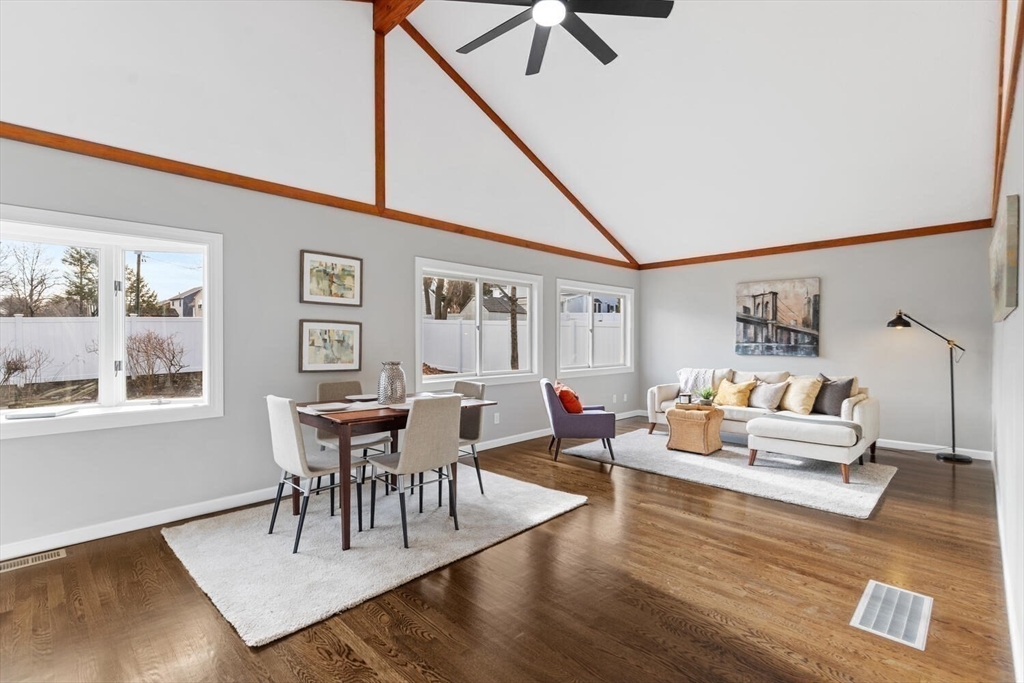 49 Butler Avenue Stoneham, MA 02180 - Photo 16 of 36 a living room with furniture and wooden floor