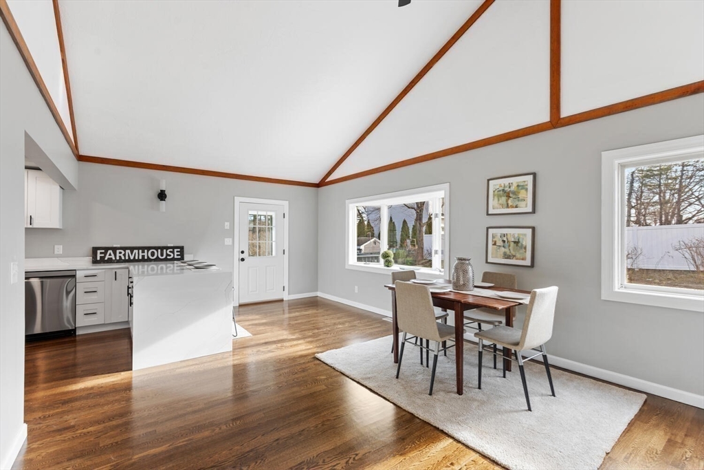 49 Butler Avenue Stoneham, MA 02180 - Photo 18 of 36 a view of a dining room with furniture and wooden floor