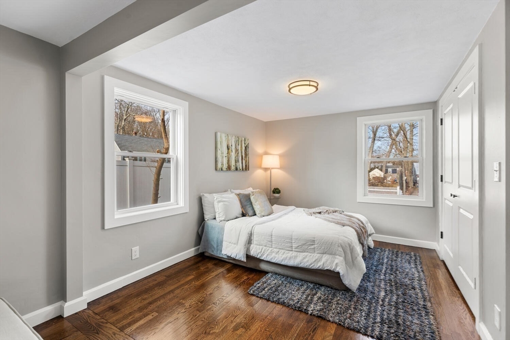 49 Butler Avenue Stoneham, MA 02180 - Photo 22 of 36 a bedroom with a bed and a window