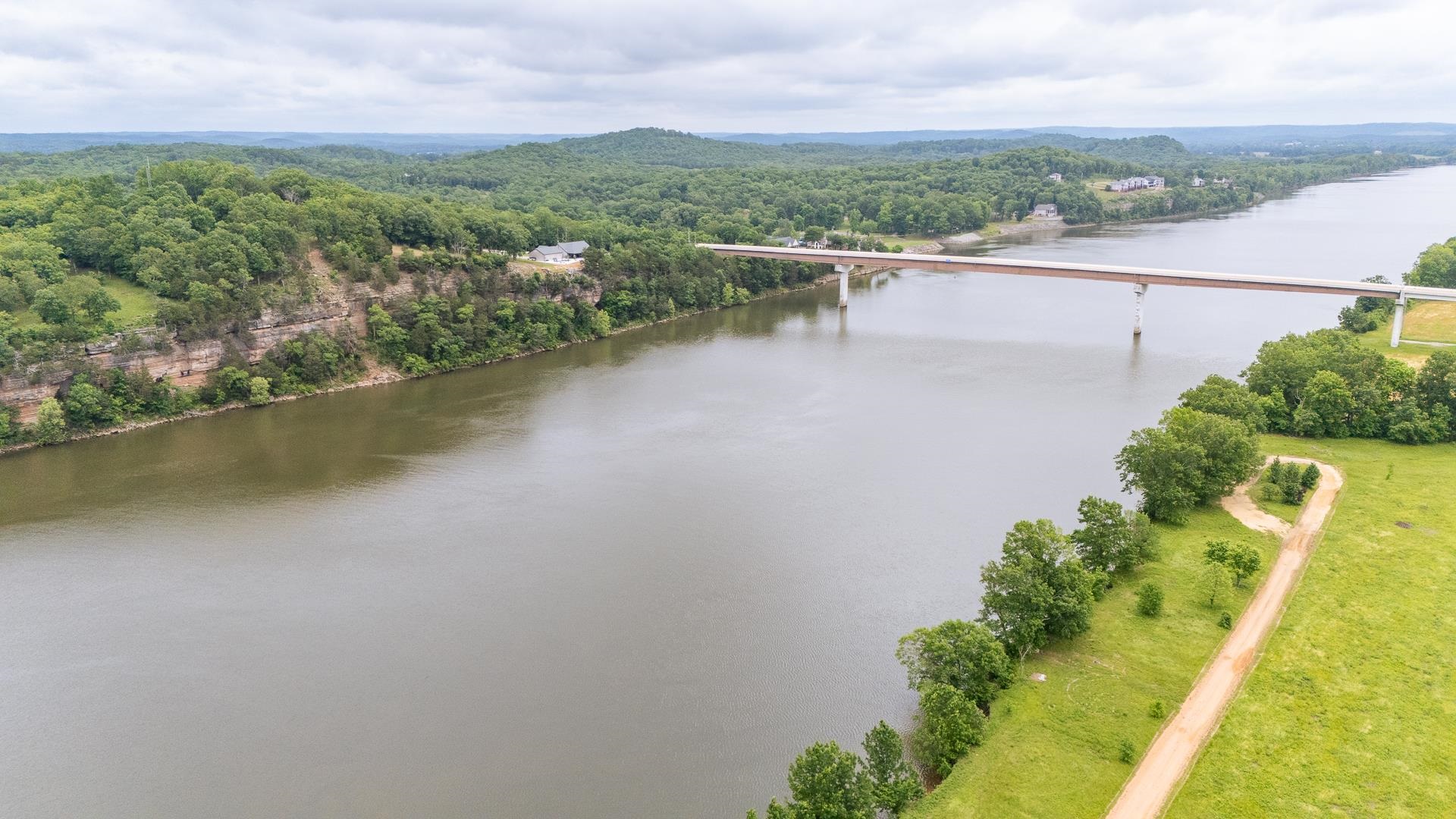 175 Bridgeview Lane Bath Springs, TN 38311 - Photo 27 of 30 an aerial view of a house with a lake view