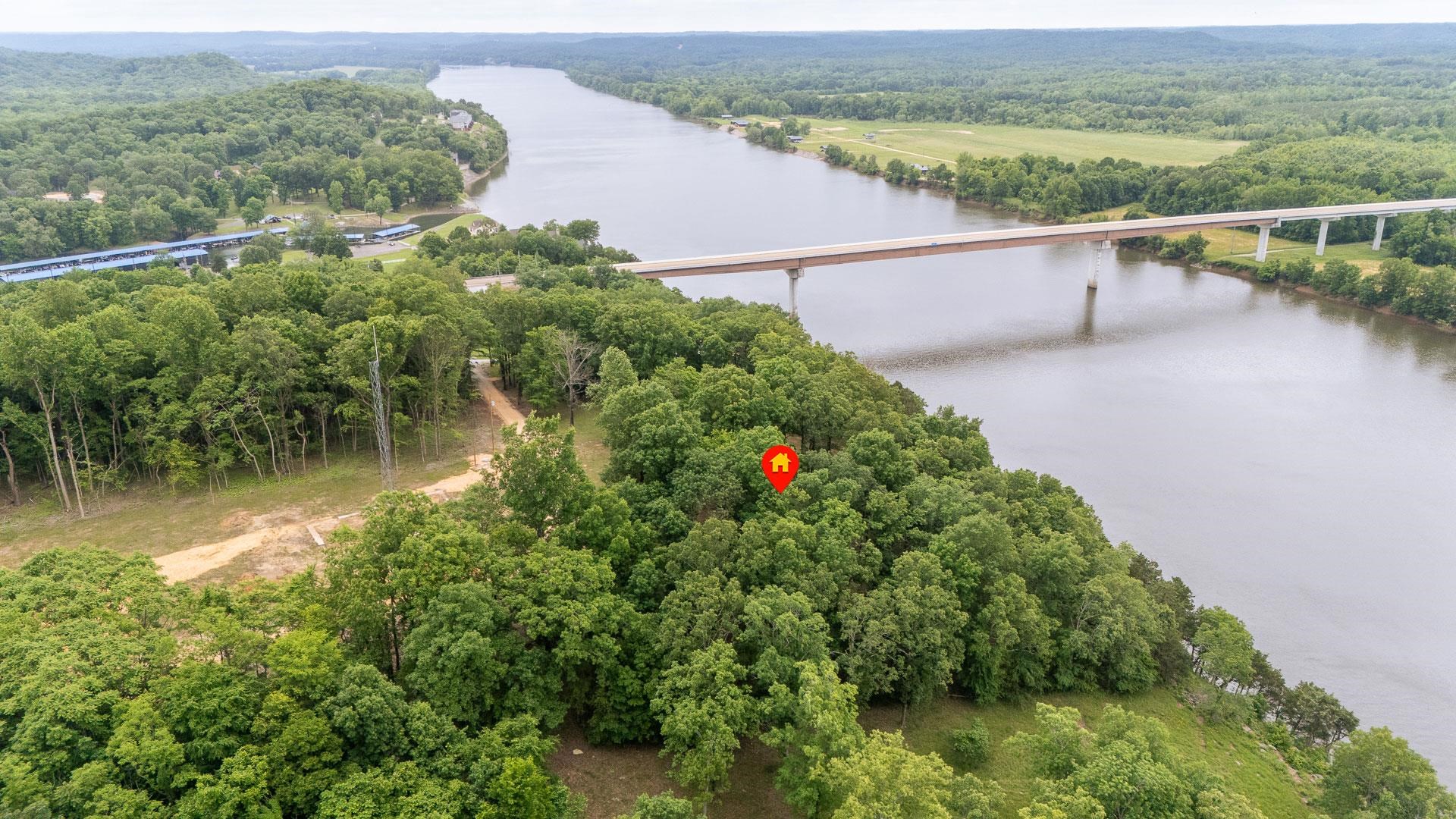 175 Bridgeview Lane Bath Springs, TN 38311 - Photo 28 of 30 a view of a lake from a balcony