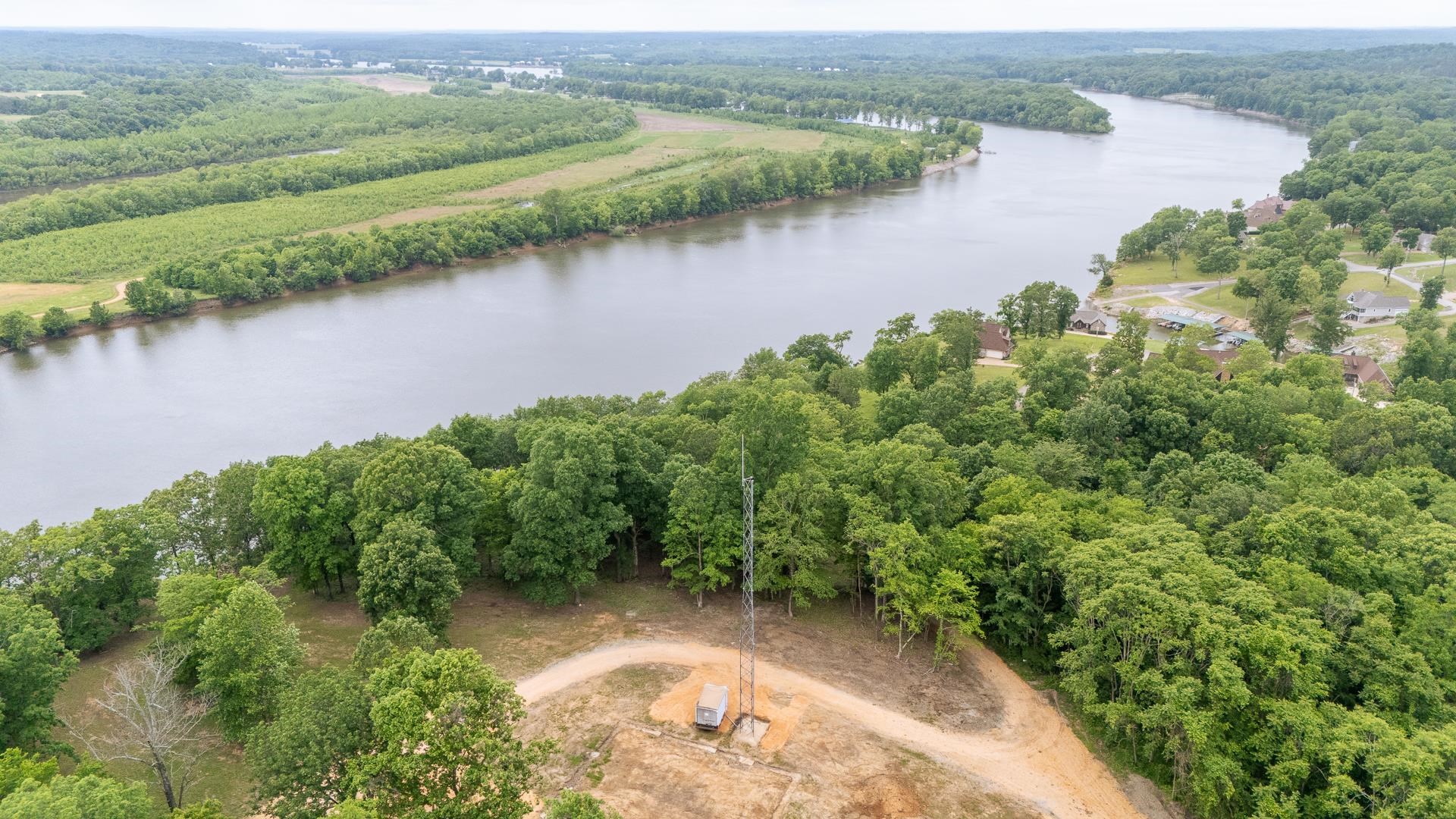 175 Bridgeview Lane Bath Springs, TN 38311 - Photo 7 of 30 an aerial view of a houses with lake view