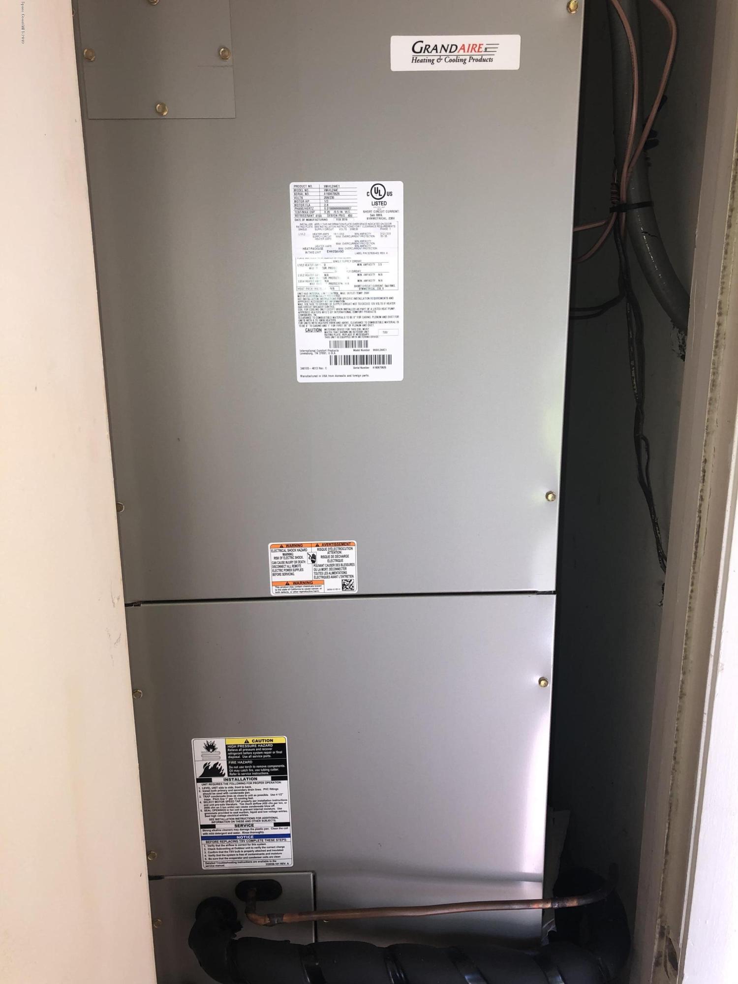 232 Abalone Road Northwest Palm Bay, FL 32907 - Photo 13 of 18 a view of washer and dryer
