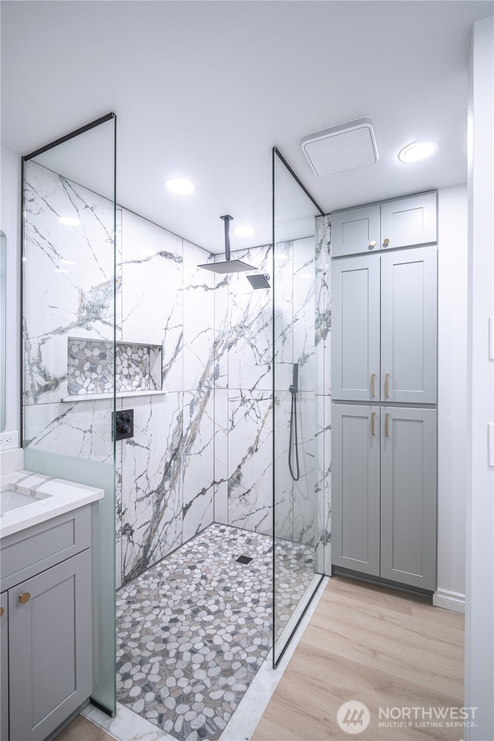 2802 Garden Court, Unit A Steilacoom, WA 98388 - Photo 17 of 29 a bathroom with a shower and a sink