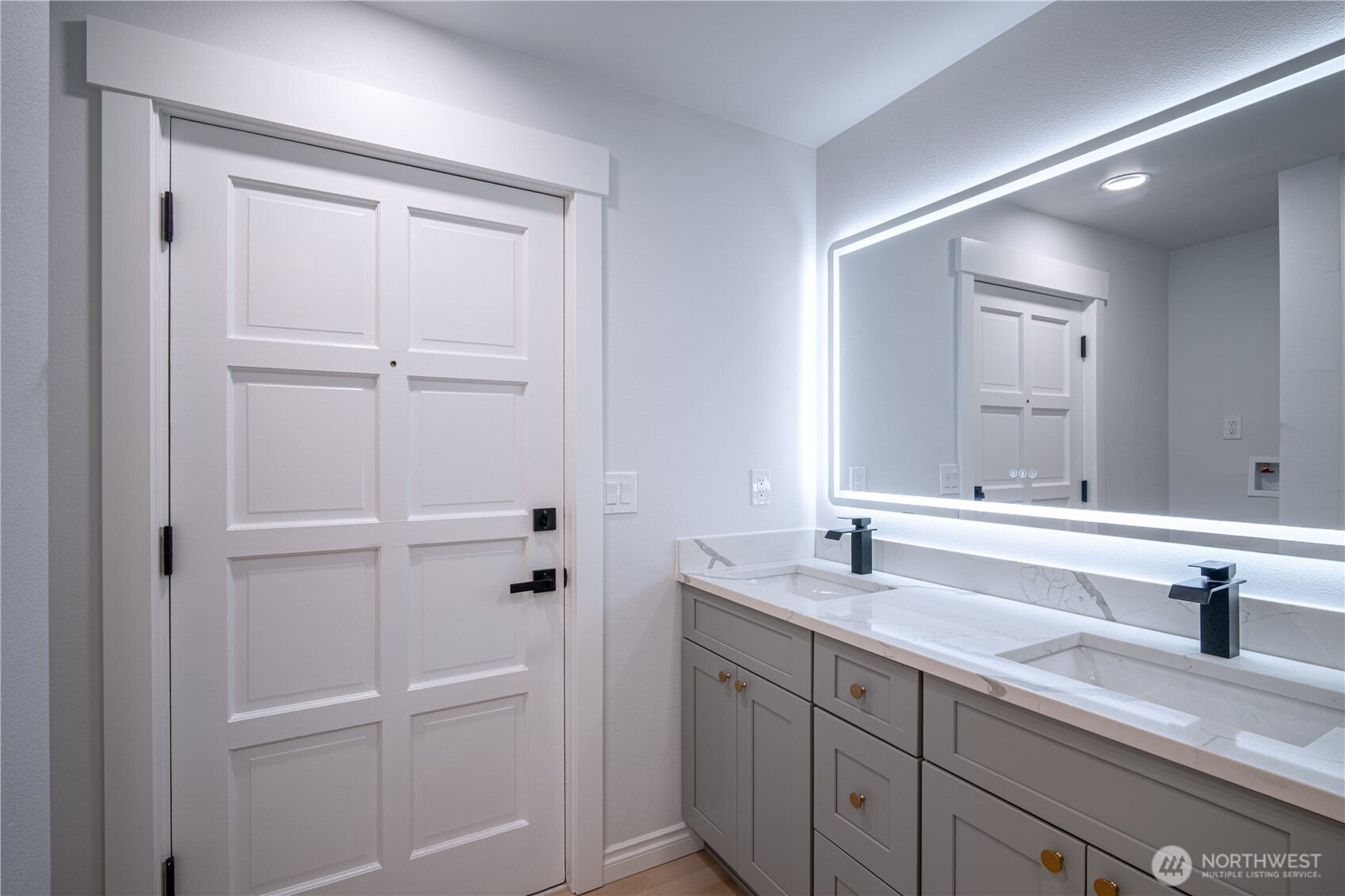 2802 Garden Court, Unit A Steilacoom, WA 98388 - Photo 19 of 29 a bathroom with a sink and a mirror