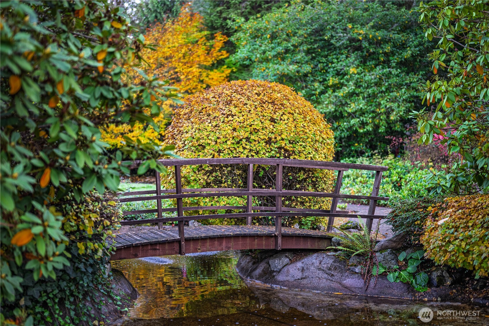 2802 Garden Court, Unit A Steilacoom, WA 98388 - Photo 28 of 29 a view of a bench in a backyard