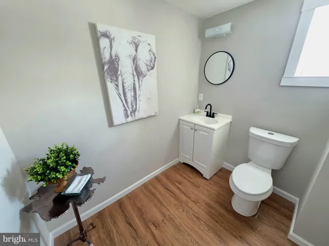 a bathroom with a toilet and a sink