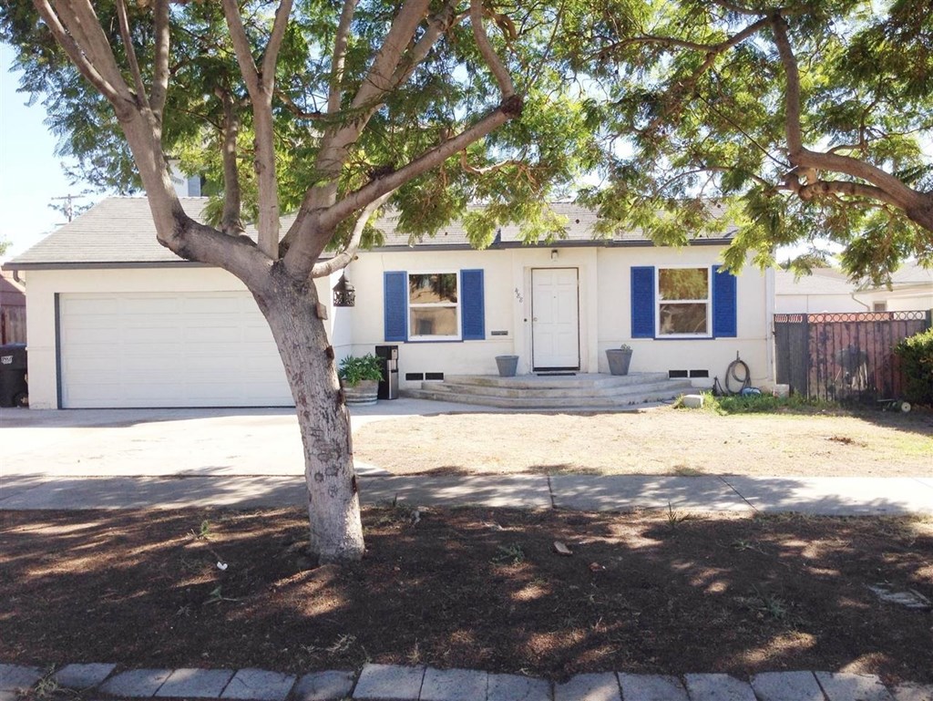 a house view with a outdoor space