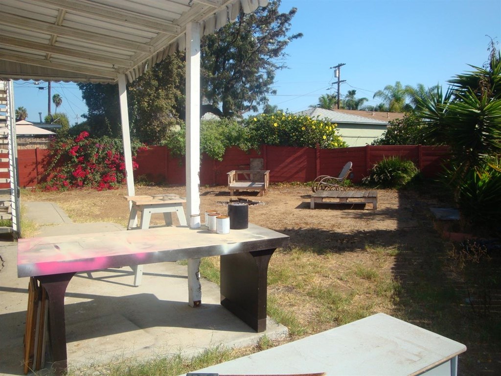 488 D Street Chula Vista, CA 91910 - Photo 19 of 19 a view of roof deck with table and chairs and potted plants