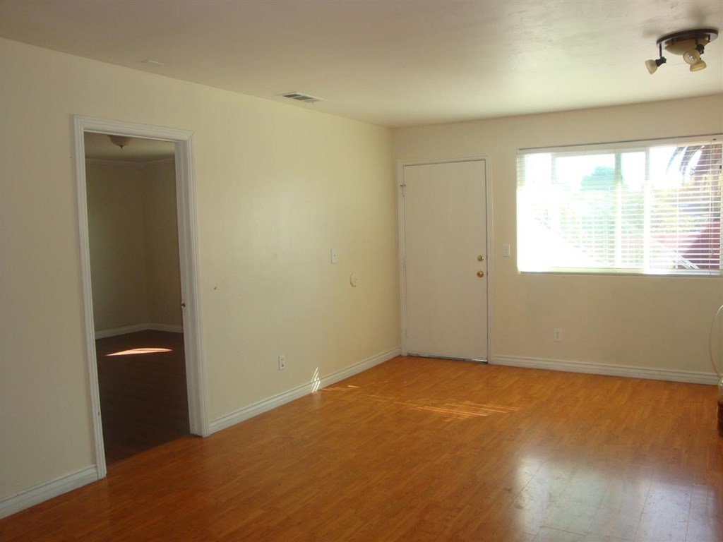 488 D Street Chula Vista, CA 91910 - Photo 3 of 19 a view of an empty room with a window
