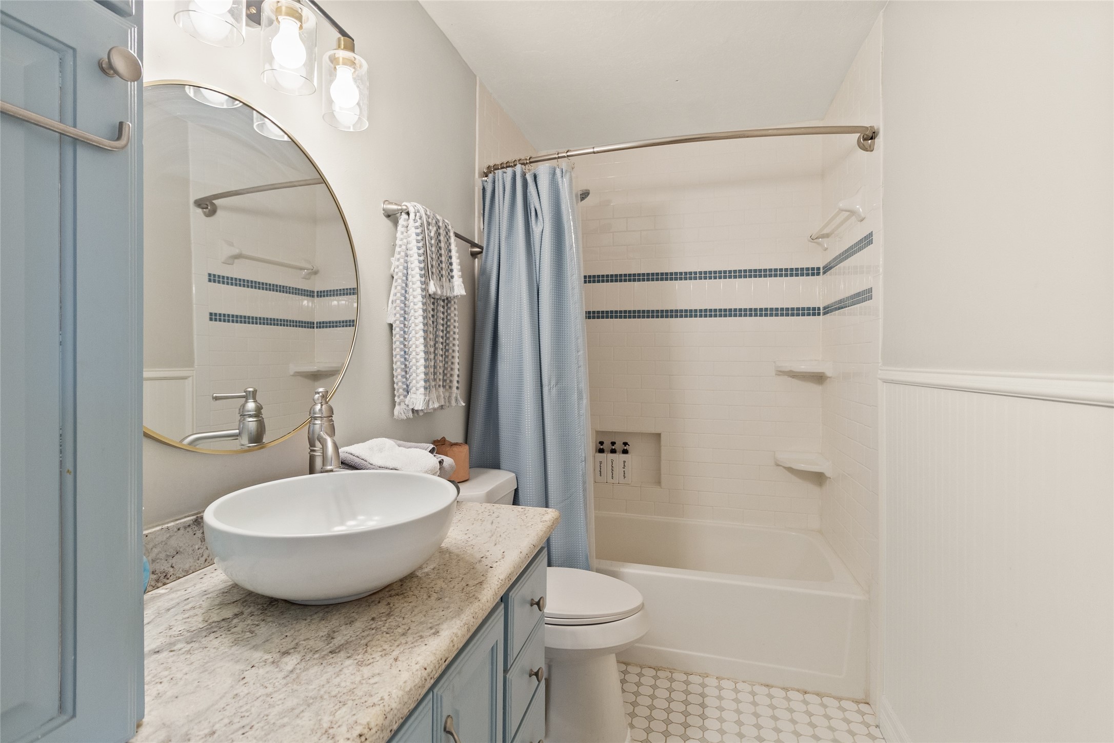 180 Jordan Road Point Blank, TX 77364 - Photo 18 of 38 a bathroom with a granite countertop sink toilet and shower