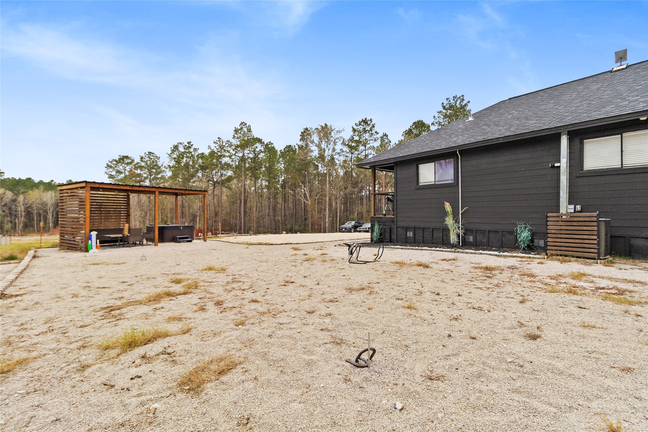 180 Jordan Road Point Blank, TX 77364 - Photo 20 of 38 a view of a backyard of a house