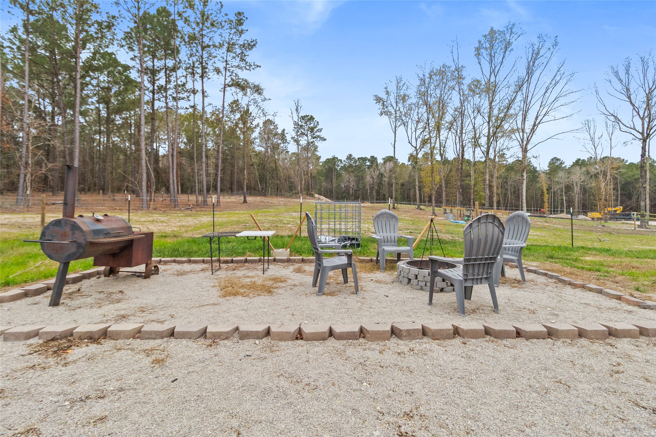 180 Jordan Road Point Blank, TX 77364 - Photo 22 of 38 a view of a park with swings and slides