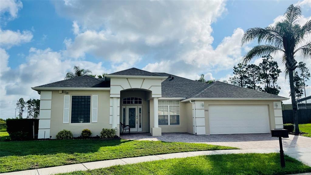 202 Nottingham Way Davenport, FL 33897 - Photo 1 of 1 Villa Front - Large Corner Lot