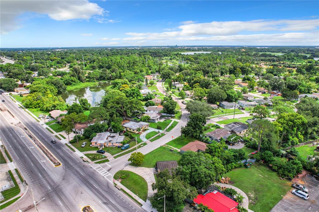 825 North Pine Hills Road Orlando, FL 32808 - Photo 2 of 8 a view of a garden