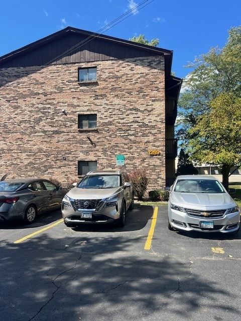 a car parked in front of a house