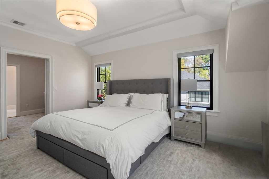 7 Massasoit Road Wellesley, MA 02481 - Photo 20 of 42 a bedroom with a bed and a window