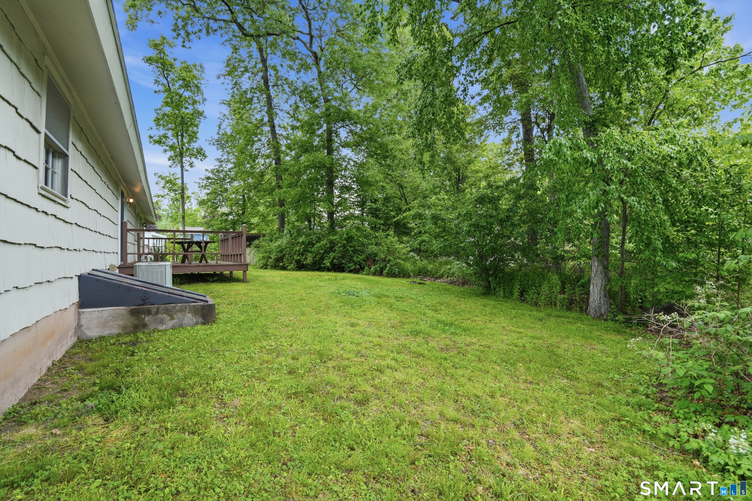 731 Still Hill Road Hamden, CT 06518 - Photo 40 of 40 a view of a garden with a bench