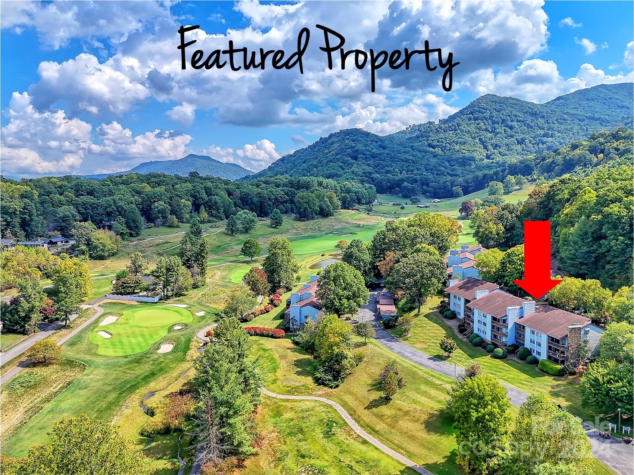 87 Willow Road, Unit B2 Waynesville, NC 28786 - Photo 1 of 38 a view of a house with a yard
