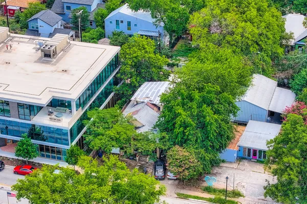 an aerial view of house with yard