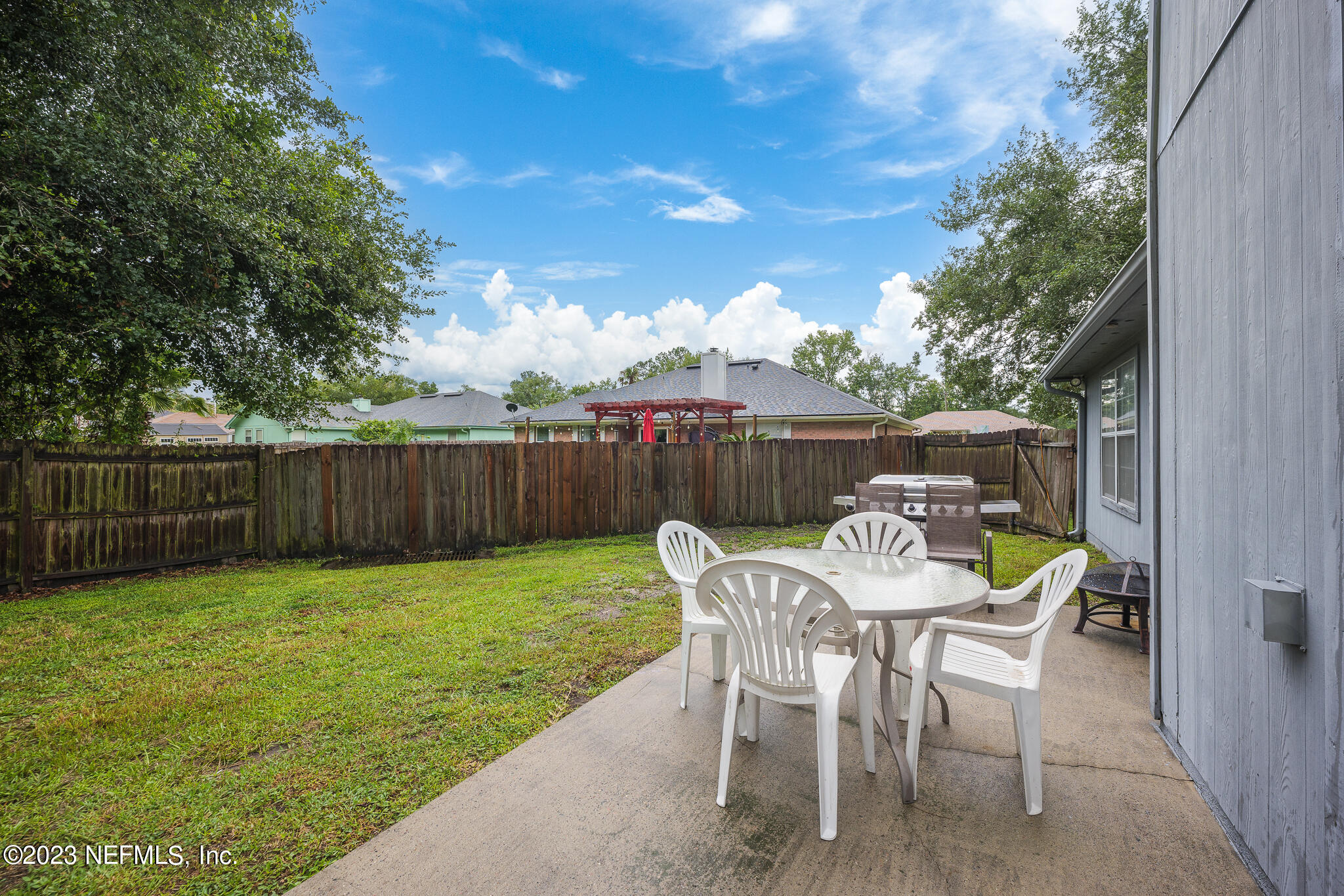 775 Camp Francis Johnson Road Orange Park, FL 32065 - Photo 33 of 41 a view of a backyard with furniture and garden