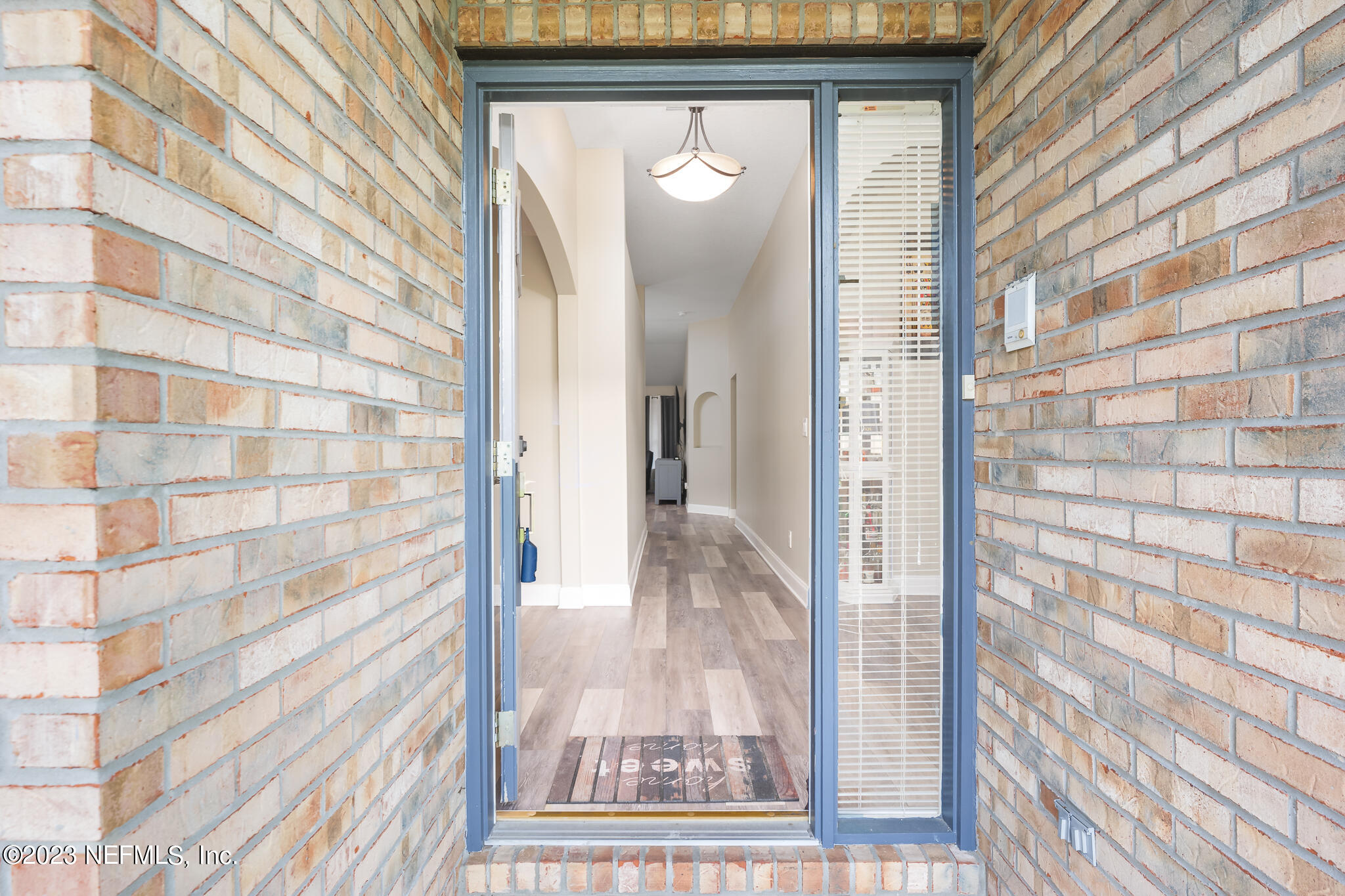 775 Camp Francis Johnson Road Orange Park, FL 32065 - Photo 5 of 41 front view of a brick house with a glass door