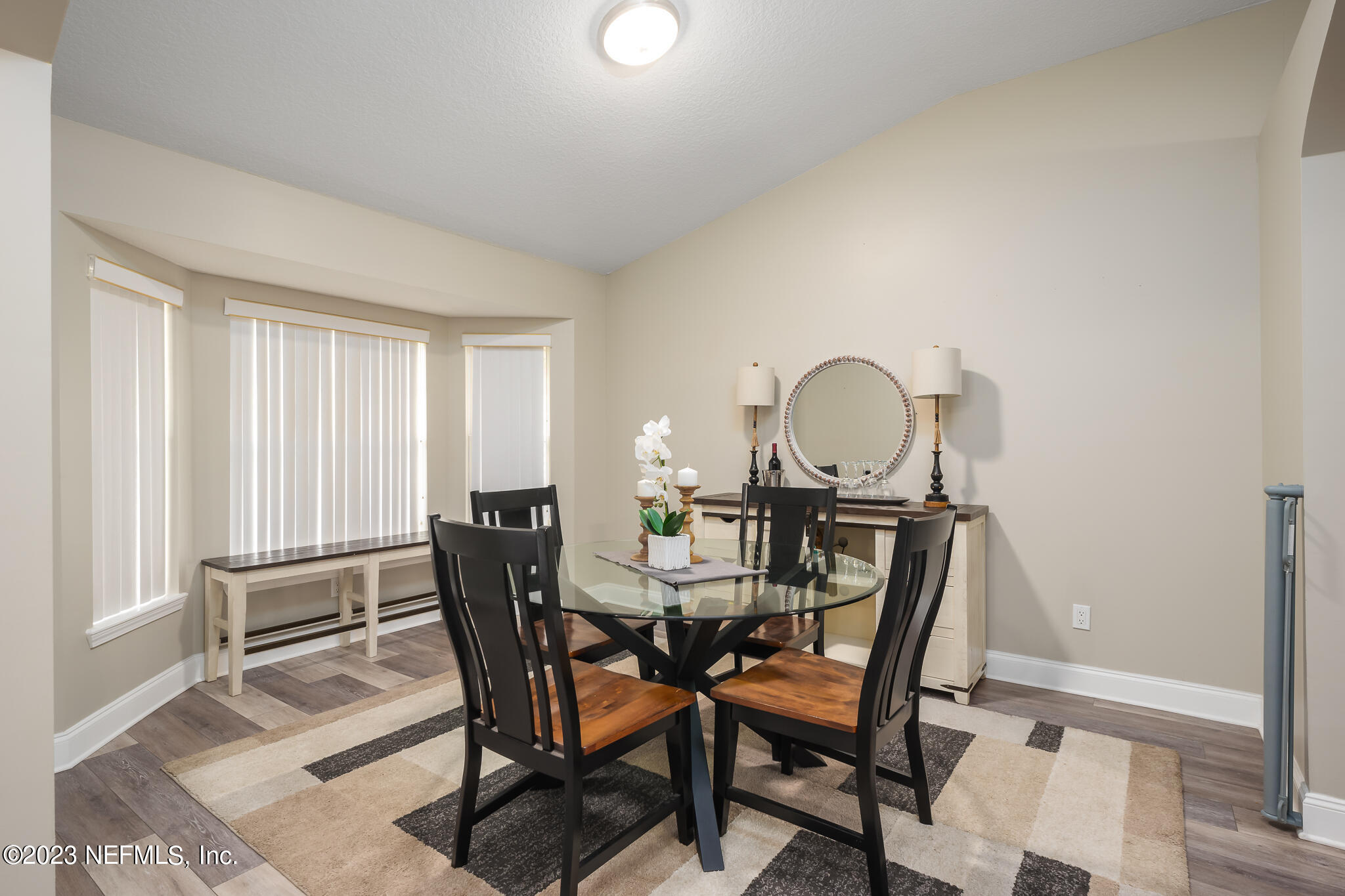 775 Camp Francis Johnson Road Orange Park, FL 32065 - Photo 7 of 41 a view of a dining room with furniture and a window