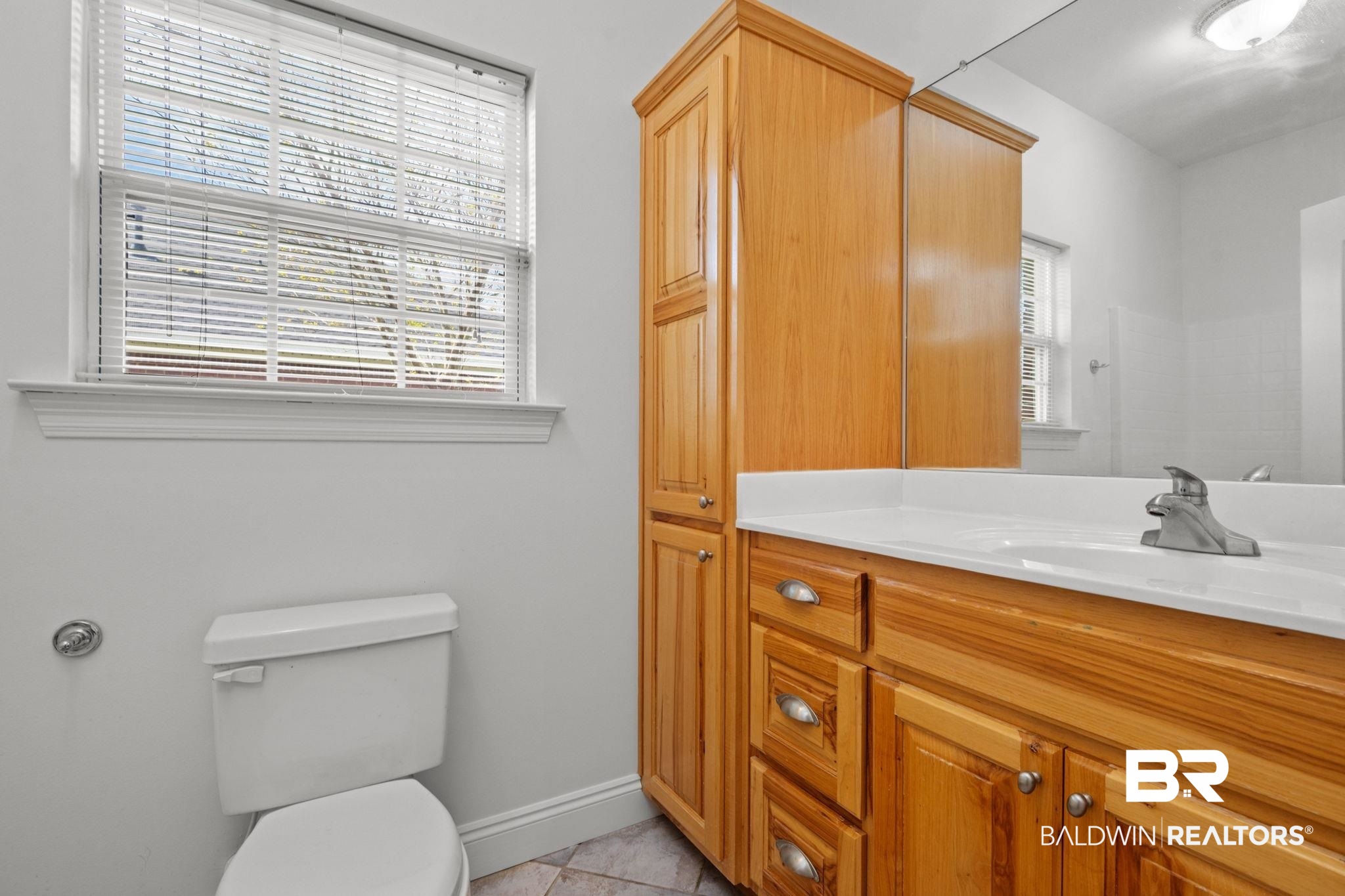 29634 St George Street Daphne, AL 36526 - Photo 39 of 47 Bathroom with vanity and light tile patterned floors