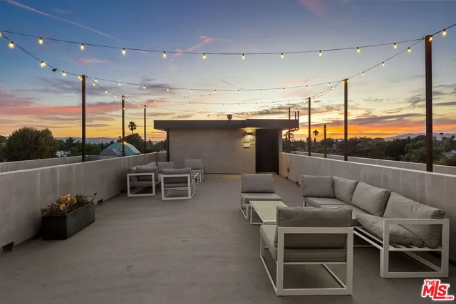 a group of chairs sitting in patio of a patio