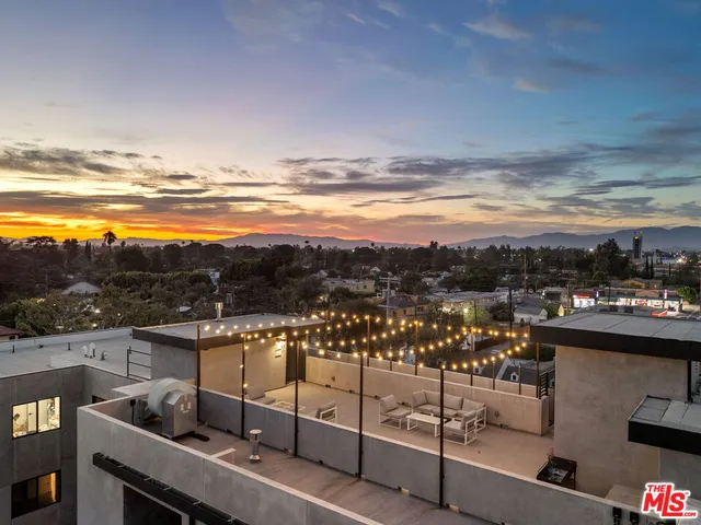 a view of a balcony with an ocean