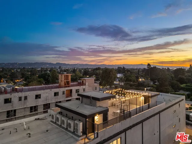 a view of city with tall buildings