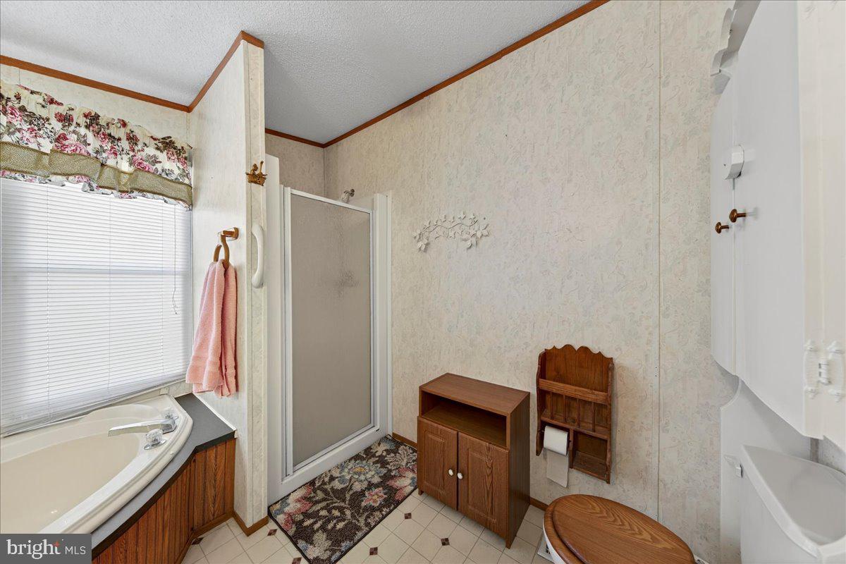 220 Chalklevel Road Louisa, VA 23093 - Photo 31 of 63 a bathroom with a tub toilet and sink