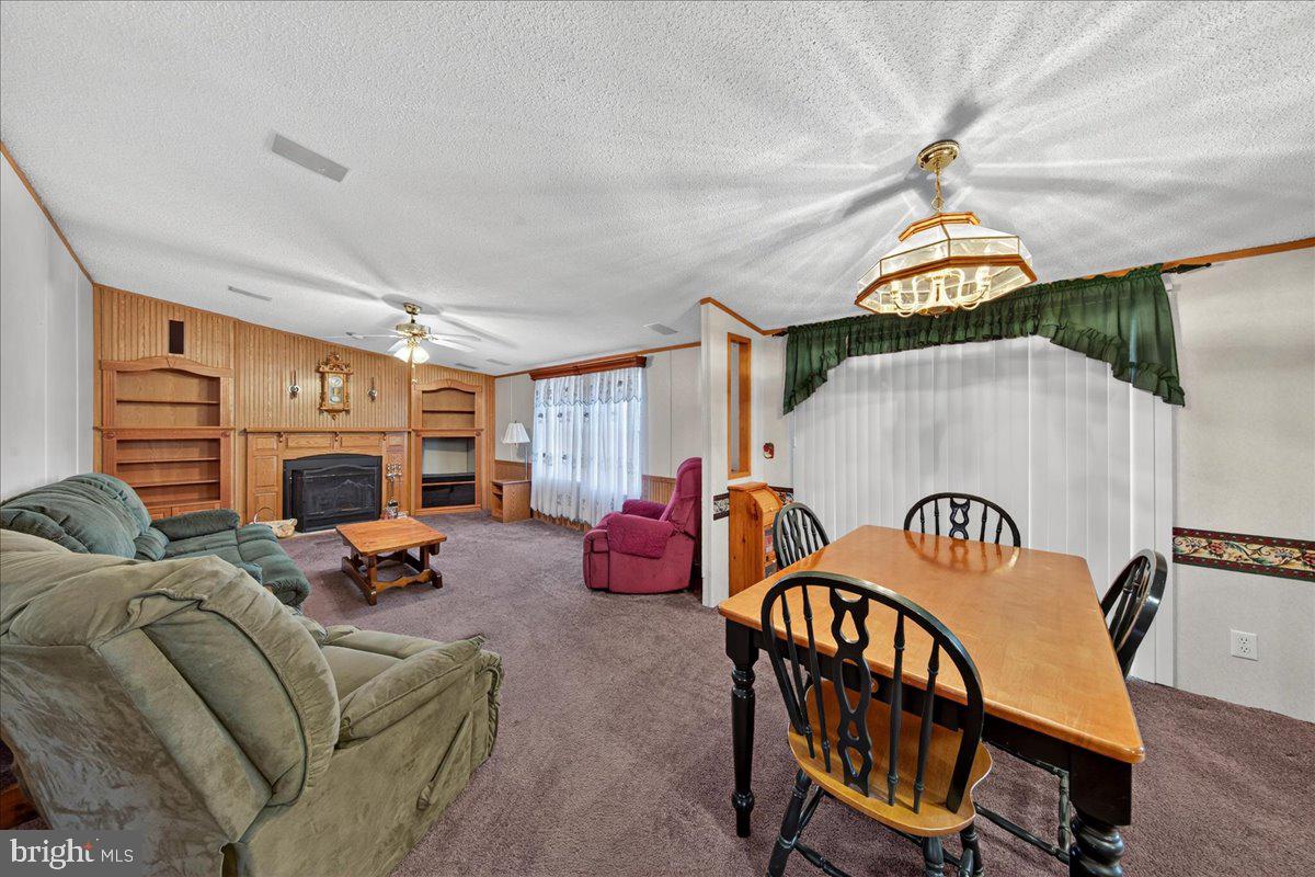 220 Chalklevel Road Louisa, VA 23093 - Photo 35 of 63 a bedroom with furniture and a fireplace