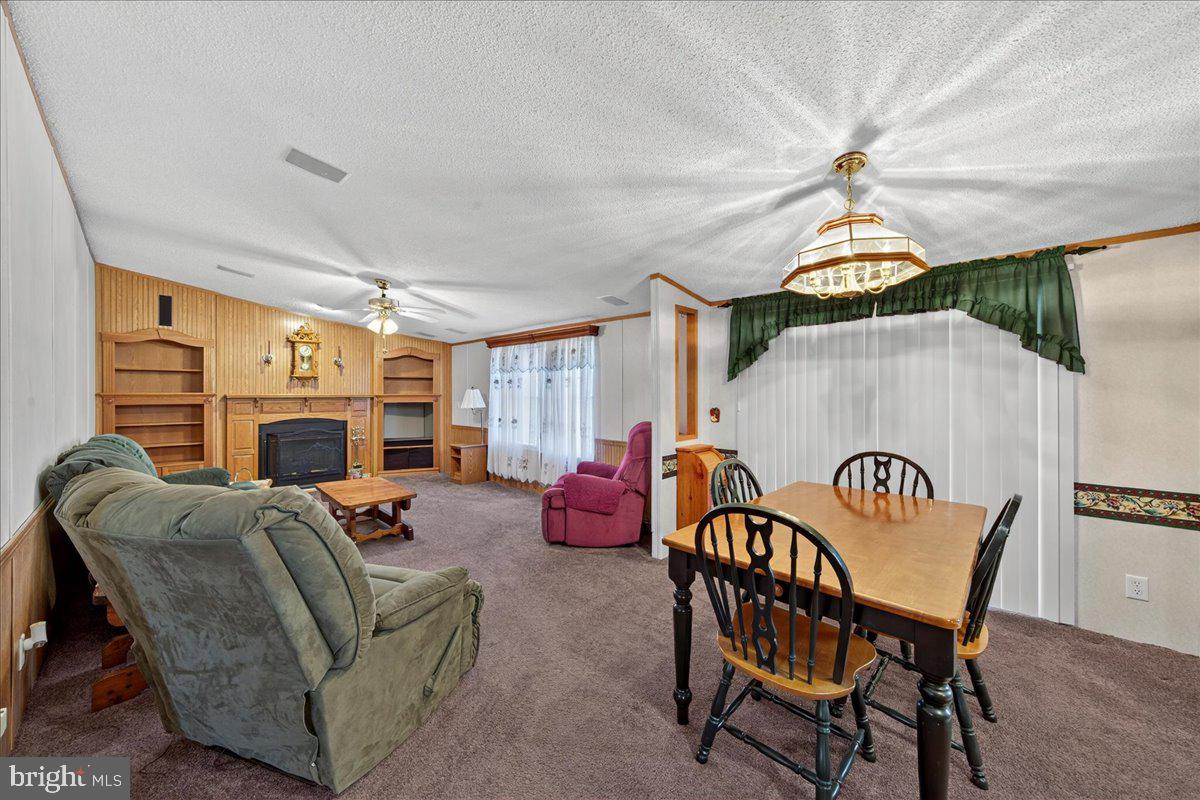 220 Chalklevel Road Louisa, VA 23093 - Photo 39 of 63 a bedroom with furniture and a fireplace