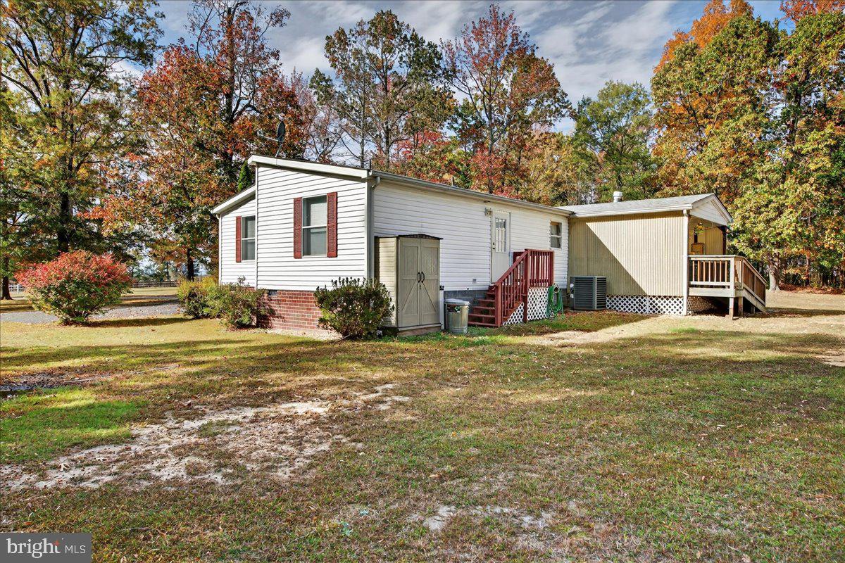 220 Chalklevel Road Louisa, VA 23093 - Photo 6 of 63 a view of a house with a yard and tree