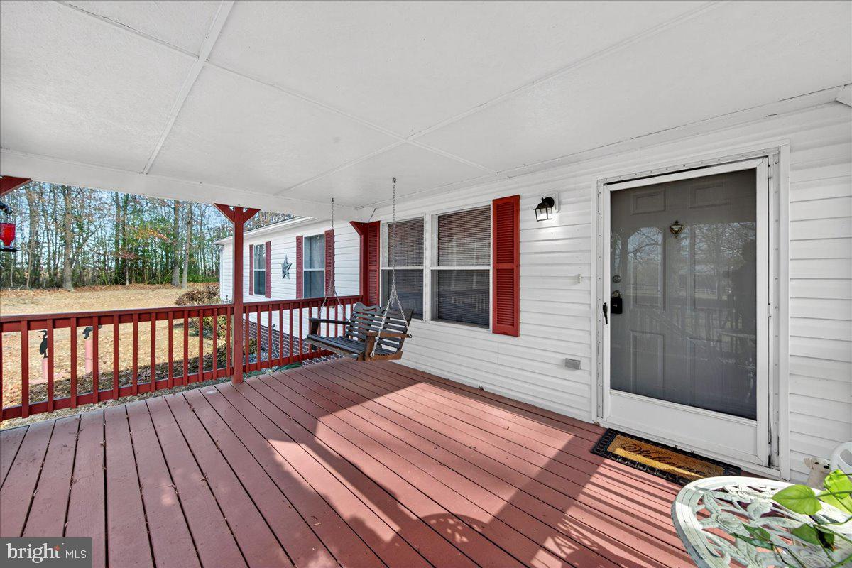 220 Chalklevel Road Louisa, VA 23093 - Photo 61 of 63 a balcony with wooden floor