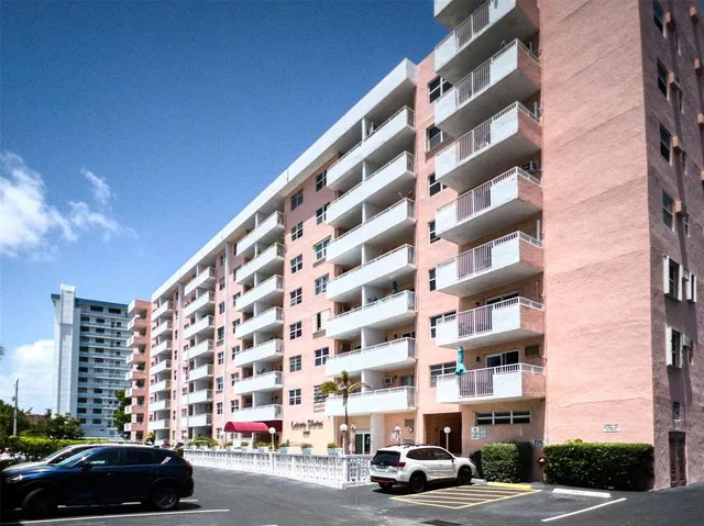 a view of balcony with furniture