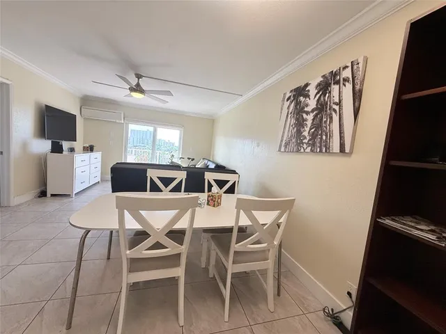 a view of a hallway and a livingroom