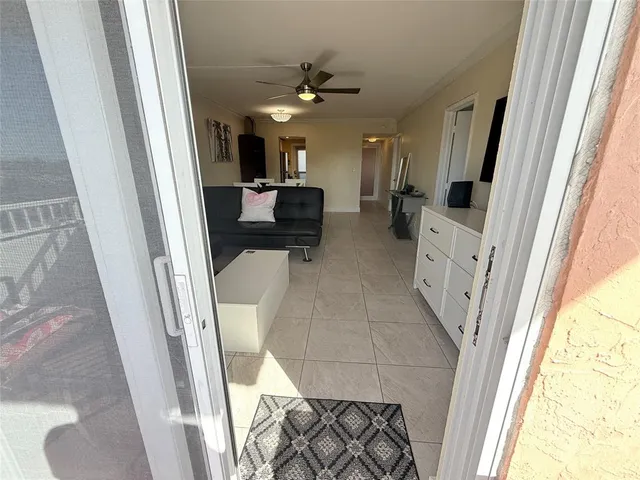 a view of swimming pool with outdoor seating