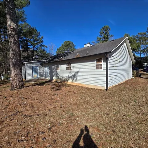 a bedroom with a bed and a closet