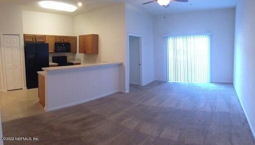 7920 Merrill Road, Unit 203 Jacksonville, FL 32277 - Photo 3 of 8 Living kitchen