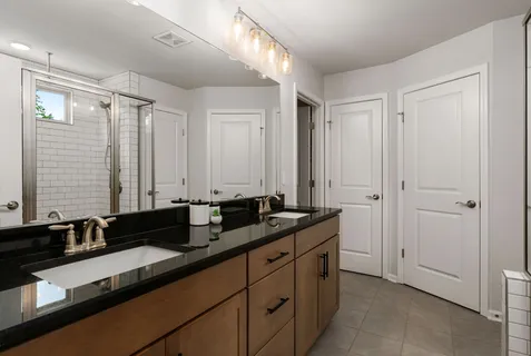 a kitchen with granite countertop a sink and a granite counter tops