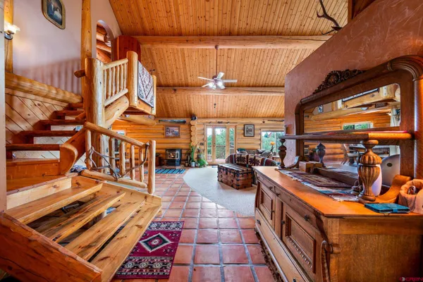 a kitchen with lots of counter space and stainless steel appliances