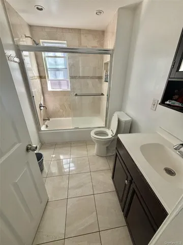 a bathroom with a toilet and a sink