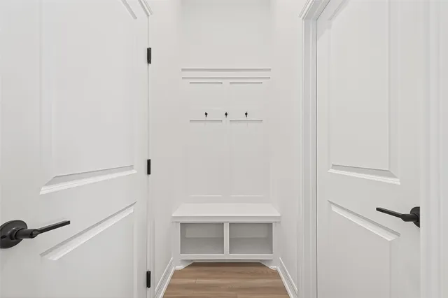 a view of staircase with white walls