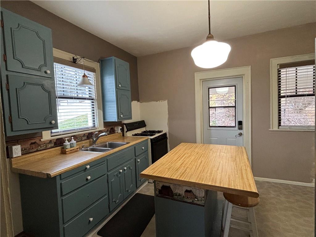 512 Regent Street Houston, PA 15342 - Photo 16 of 29 a kitchen with a sink and a window