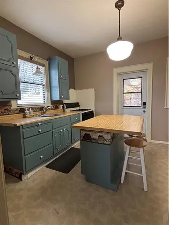 a room with a table and hallway