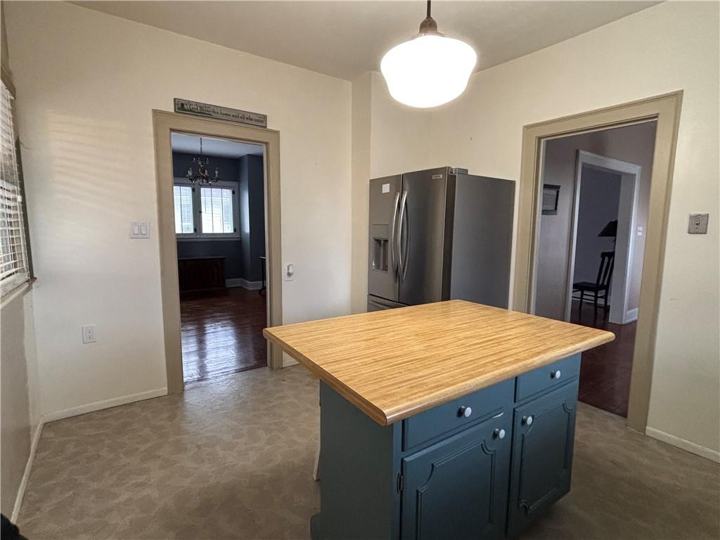 512 Regent Street Houston, PA 15342 - Photo 18 of 29 a room with a table and hallway