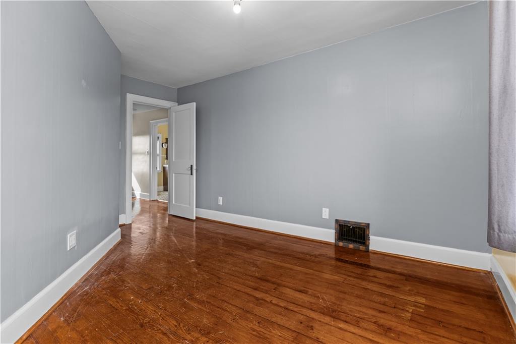 512 Regent Street Houston, PA 15342 - Photo 25 of 29 a view of an empty room and wooden floor