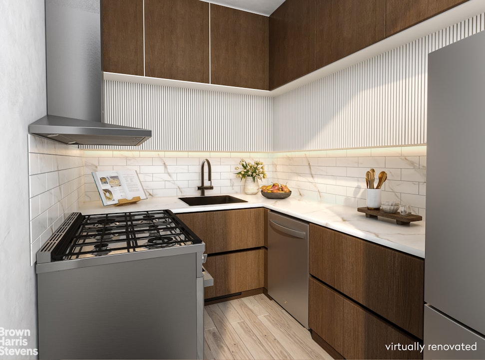301 East 62nd Street, Unit 14B Manhattan, NY 10065 - Photo 6 of 14 a kitchen with a sink a stove and cabinets